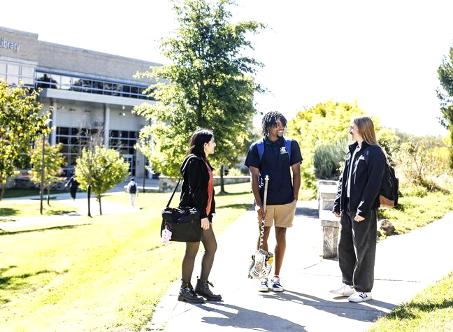 Three Fresh Faces students walking to class together.