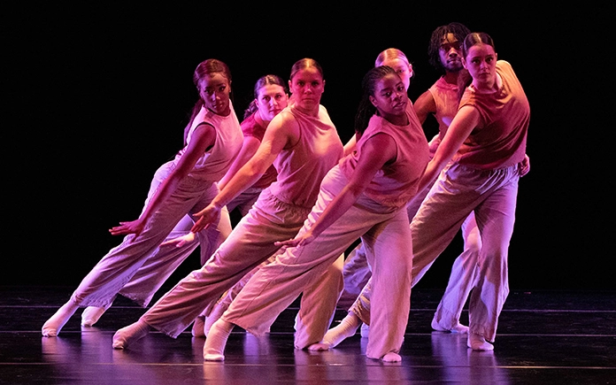 Group of dancers performing on stage