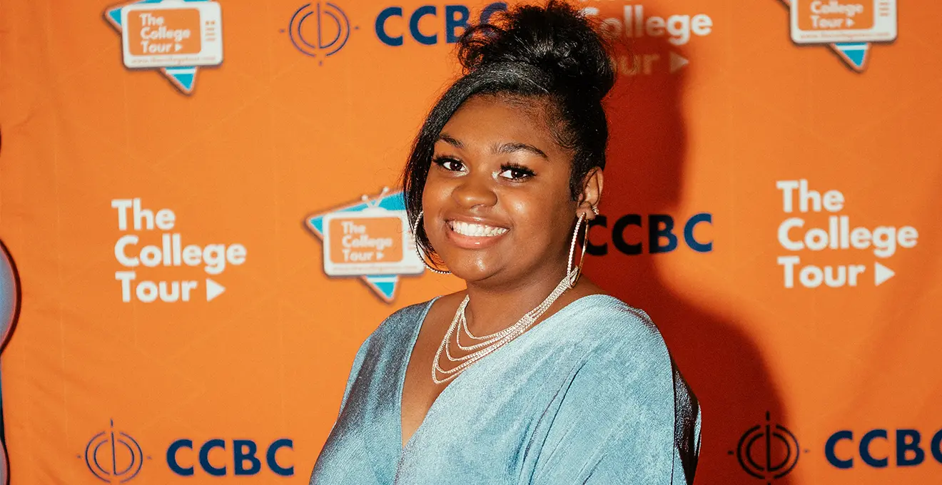 Asia Lee posing at the College Tour premiere