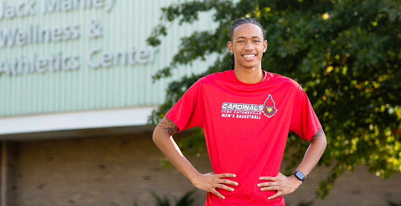 Picture of CCBC student outside gymnasium building