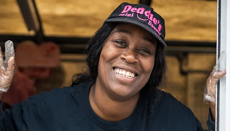 The owner, Robin, of Deedle's Mini Donuts