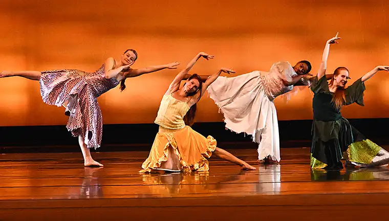 Group of CCBC dance students performing on stage
