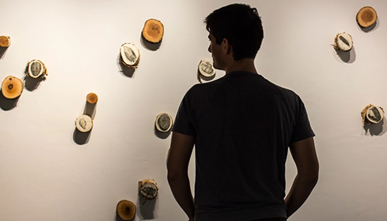 Student looking at exhibit