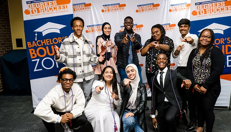 A group of ten graduating Degrees to Succeed students at their completion ceremony event.