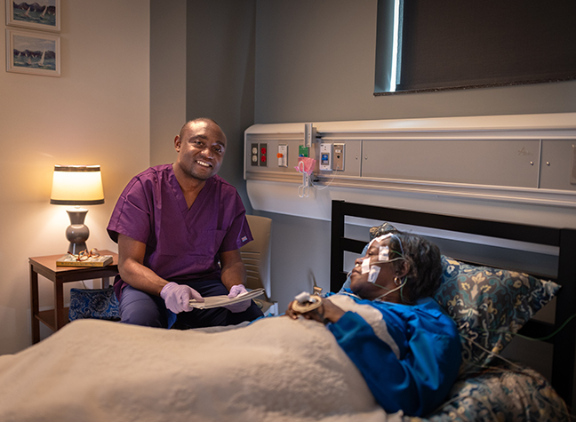 photo of sleep tech and patient.