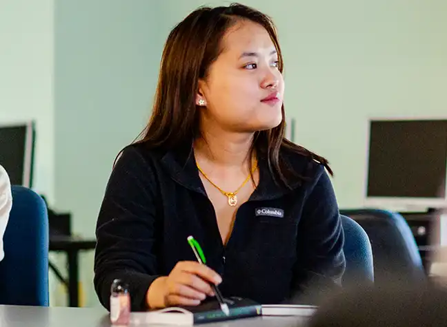 International student sitting in class