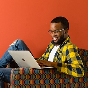 Male student on laptop