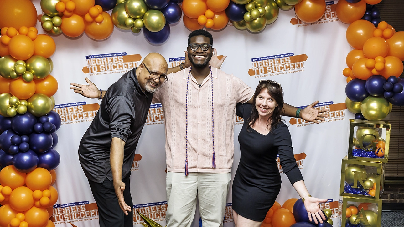 A graduating Degrees to Succeed student celebrates all of his accomplishments with the faculty and staff who supported him along the way.