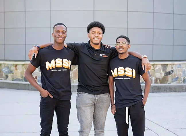 Three MSSI students. 